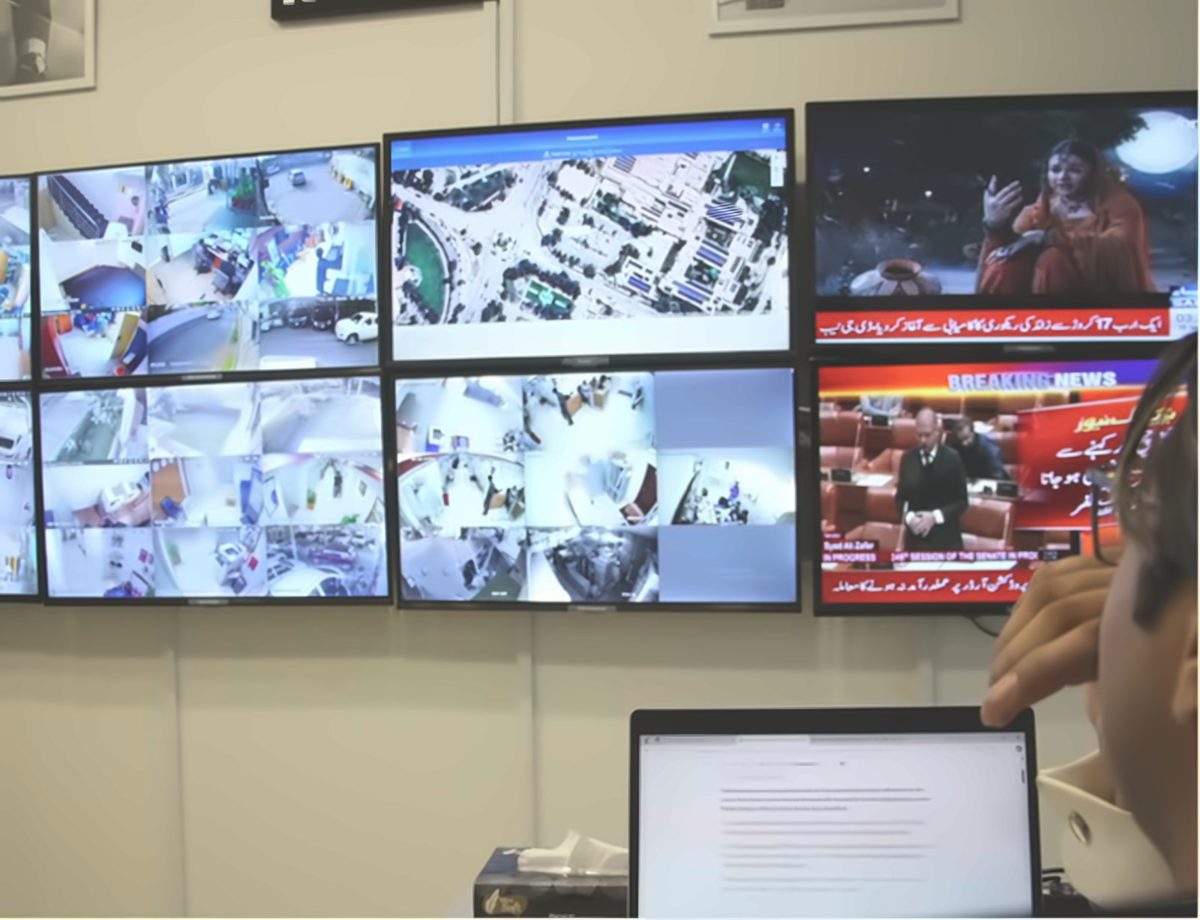 KRATOS SOC operator monitoring the video wall of CCTV feeds, live maps and news