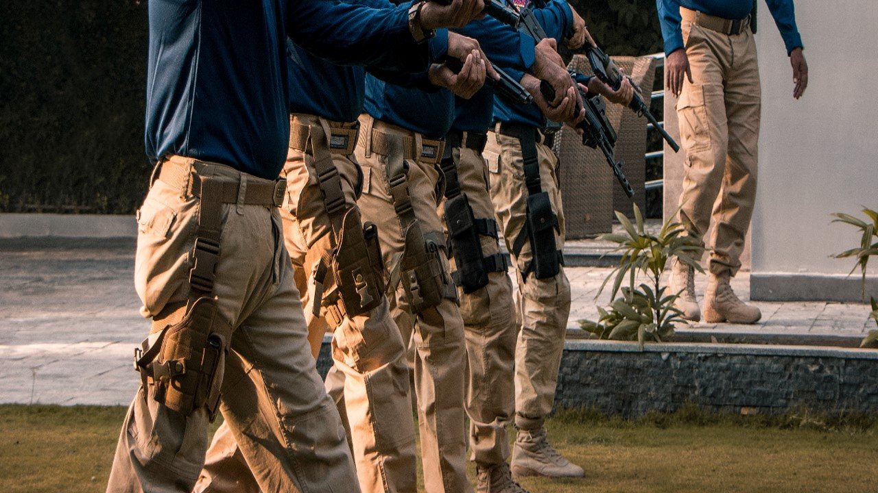 KRATOS protective team in tactical uniform standing in formation during a drill